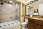 Guest Bathroom, with full size stand up shower and tub